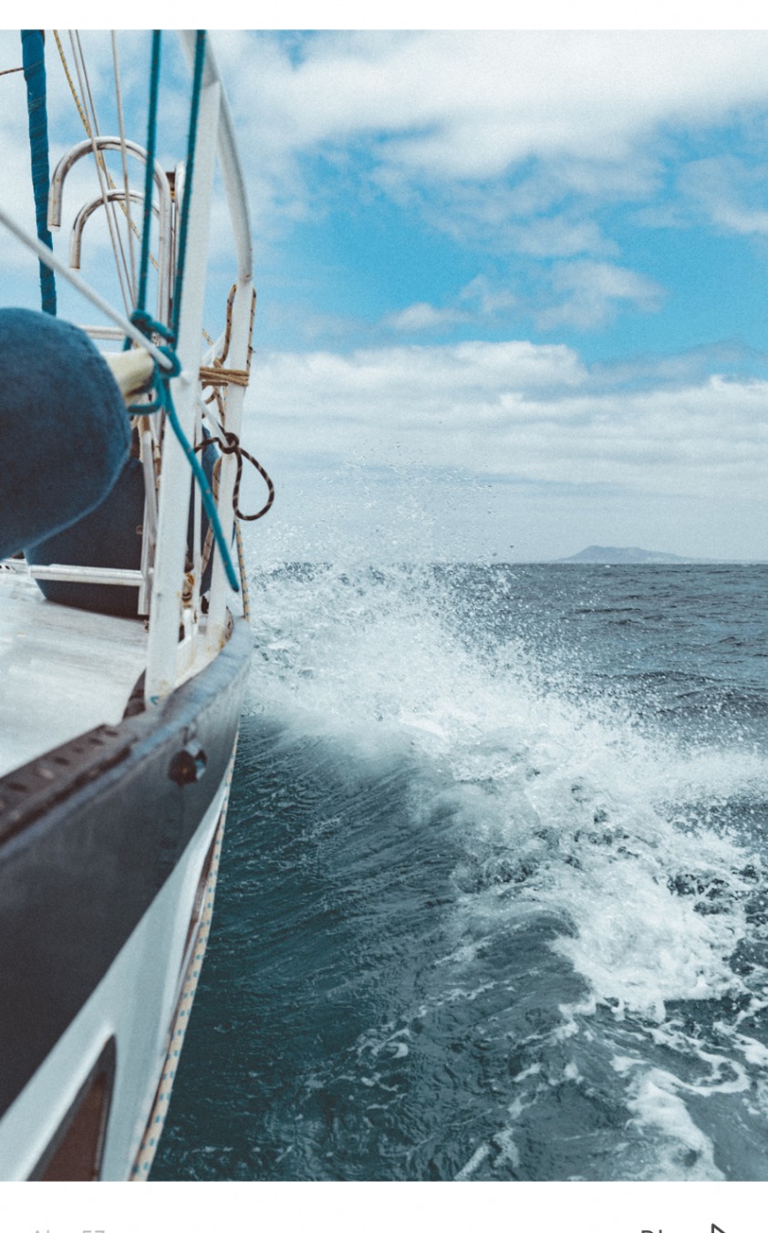 Sea spray beside the yacht while sailing off Corralejo